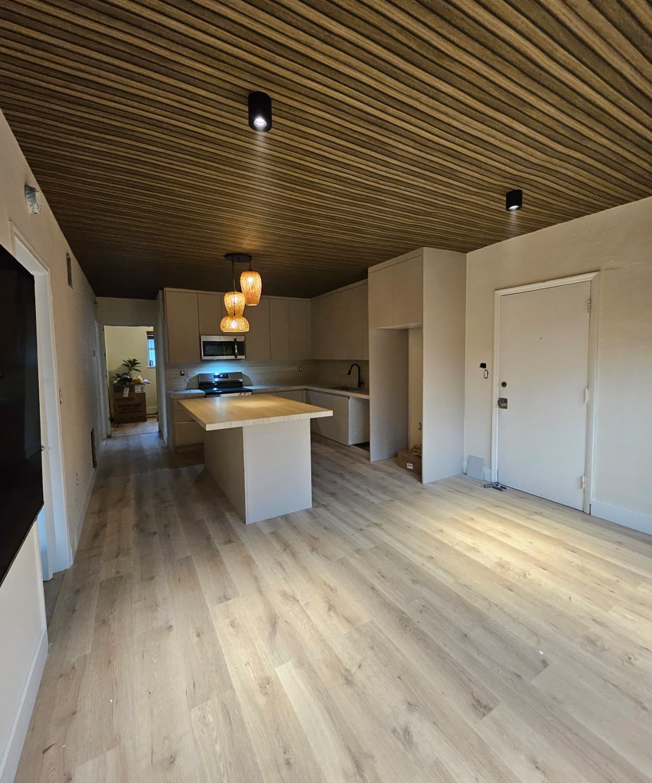 Additional view of the remodeled kitchen and living area