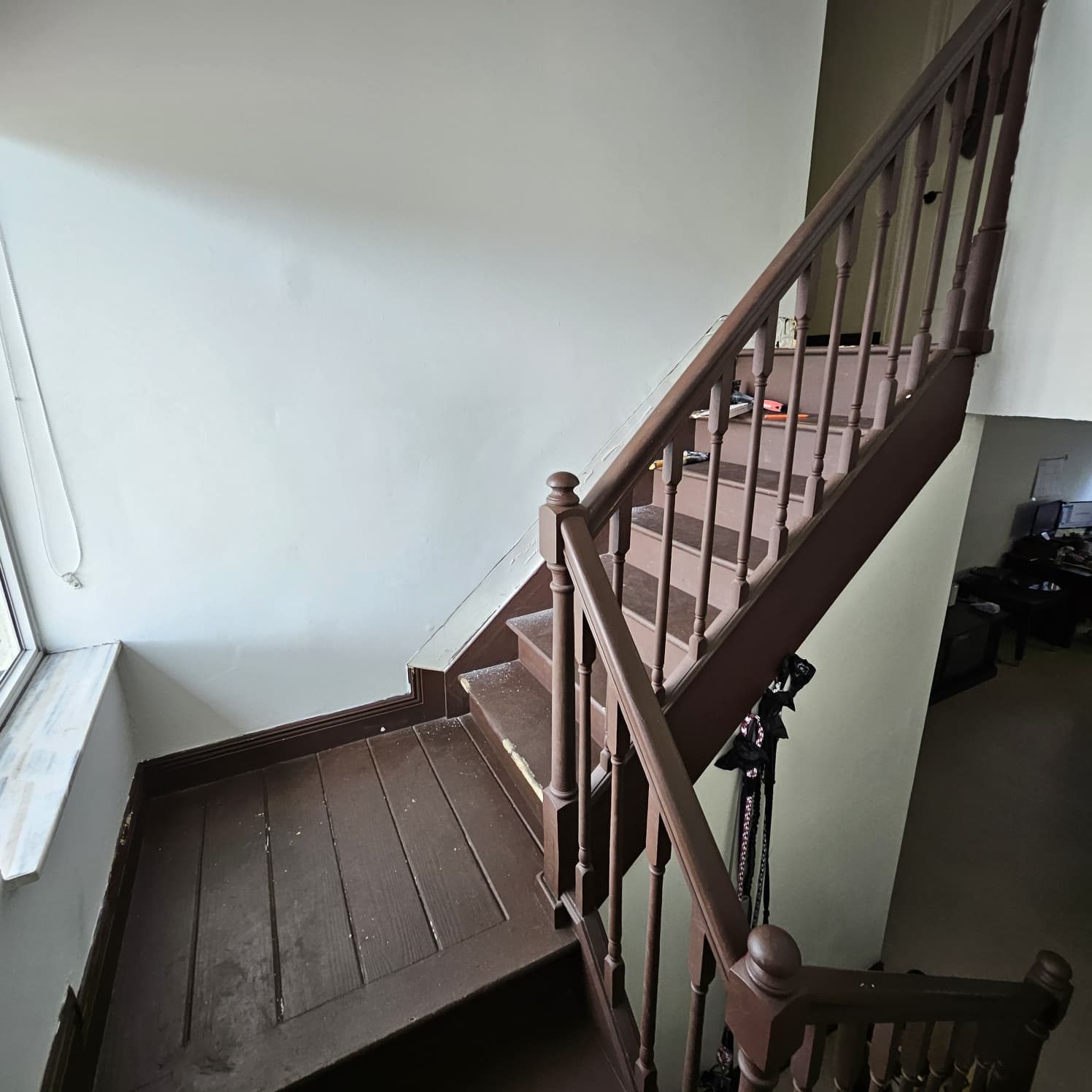 Dark staircase before renovation
